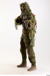 Andrew Elliott in Ghillie Aiming Gun aiming gun standing whole…